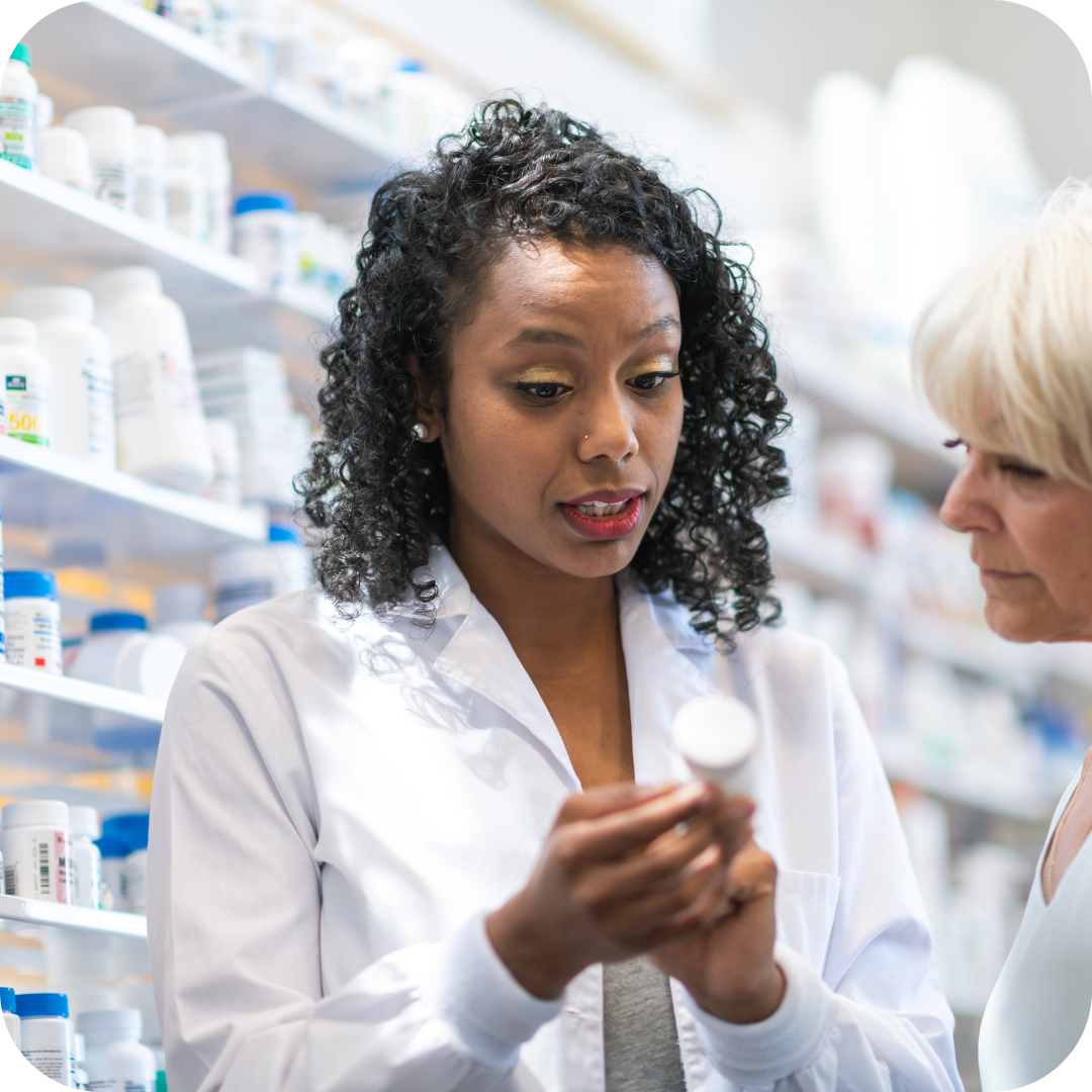 Friendly pharmacist discussing treatment options with patient